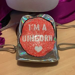 Chameleon silver unicorn mini backpack. Sequin changing picture. Long straps